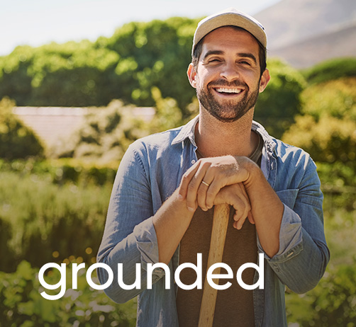 smiling man in field